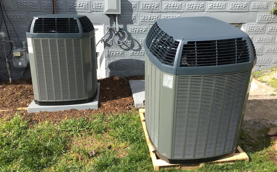 CAM Heating & Cooling | Etowah, NC | units outside house CAM Heating & Cooling | Etowah, NC | units outside house